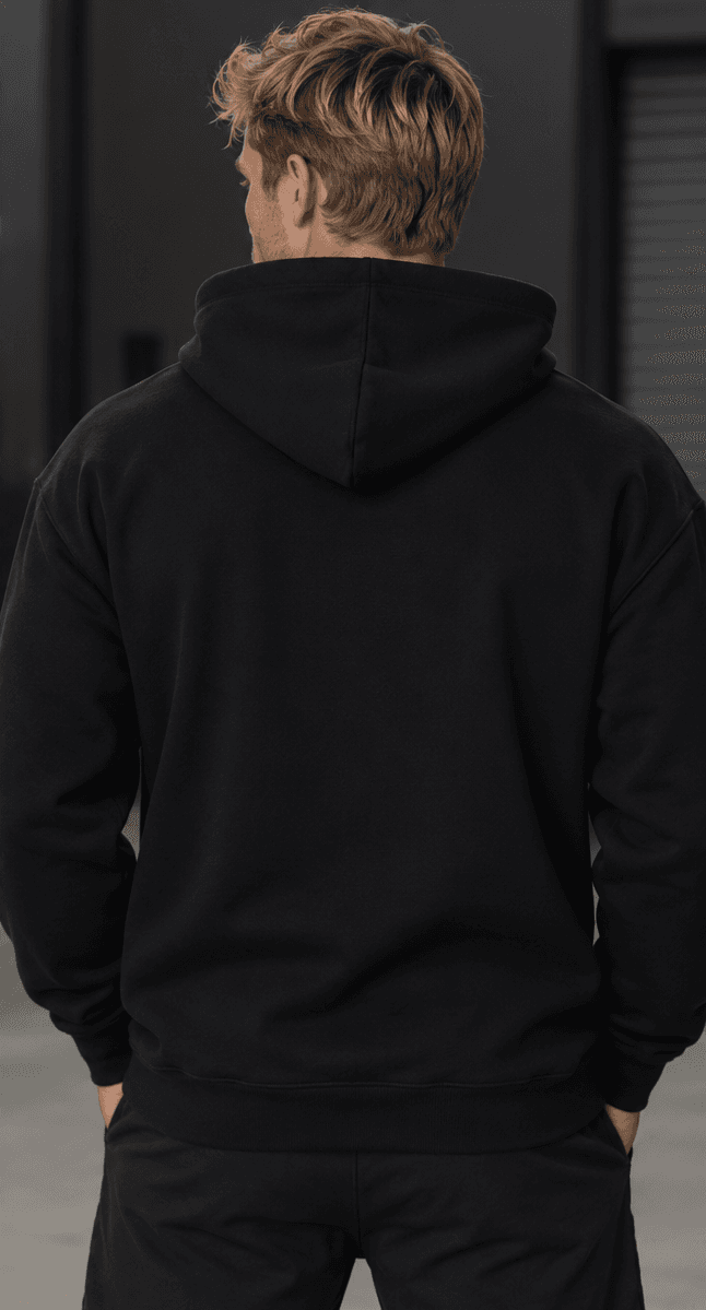 Middlefinger Collective Essential Hoodie in black, back, on model